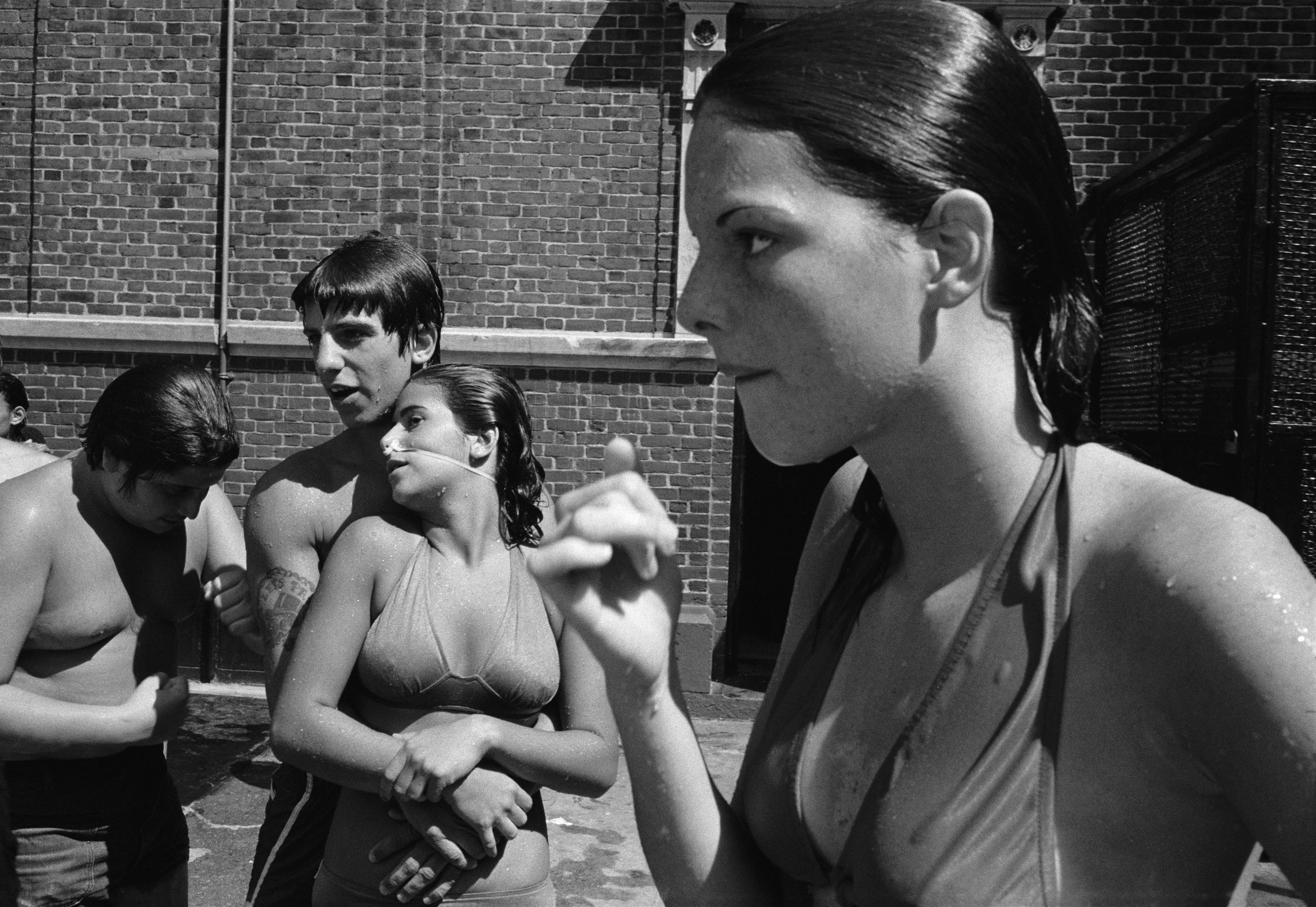 10 Susan Meiselas Pebbles with Enzo and Tina at the Carmine Street pool Little Italy New York City 1978
